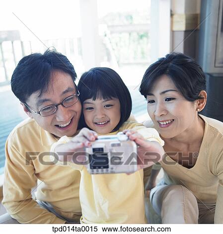 family, Asian, digital camera, cameraparents, person, photograph View Large Photo Image Stock Photography - family, Asian, digital camera, cameraparents, person, photograph. Fotosearch