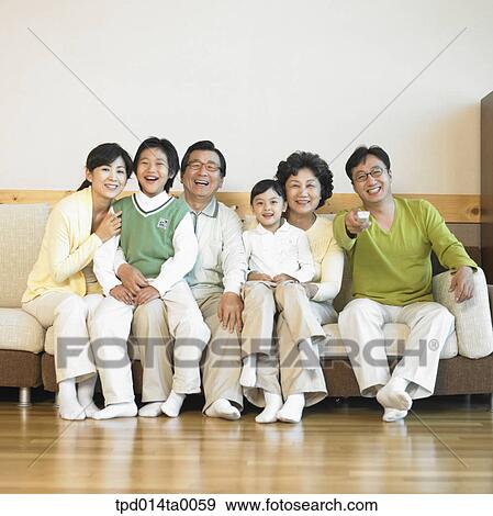 family, living room, group, old, Asian, remote control View Large Photo Image Stock Photo - family, living room, group, old, Asian, remote control. Fotosearch