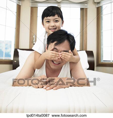 hoodwinking, Asian, daughter, person, inside, dad View Large Photo Image Stock Photo - hoodwinking, Asian, daughter, person, inside, dad. Fotosearch
