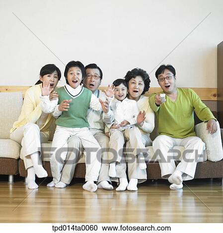 living room, old, Asian, remote control, parents, person View Large Photo Image Stock Image - living room, old, Asian, remote control, parents, person. Fotosearch