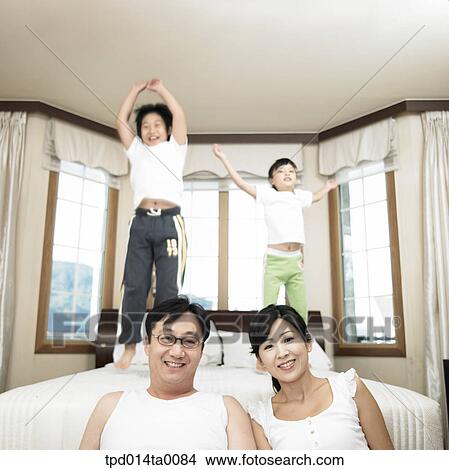 people, couple, inside, lifestyle, person, Asian View Large Photo Image Picture - people, couple, inside, lifestyle, person, Asian. Fotosearch