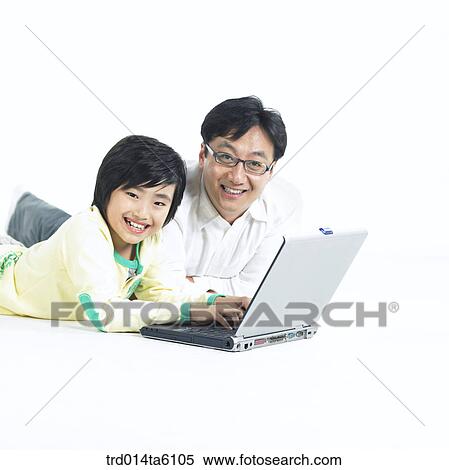 family, notebook, object, friendly, Asian, smile View Large Photo Image Stock Photography - family, notebook, object, friendly, Asian, smile. Fotosearch