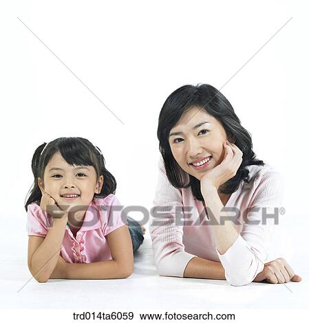 Stock Photo - family, object, friendly, Asian, daughter, smile, parents. Fotosearch