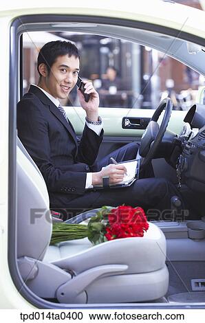 Stock Image - bouquet, Asian, business, businessman, person, inside. Fotosearch