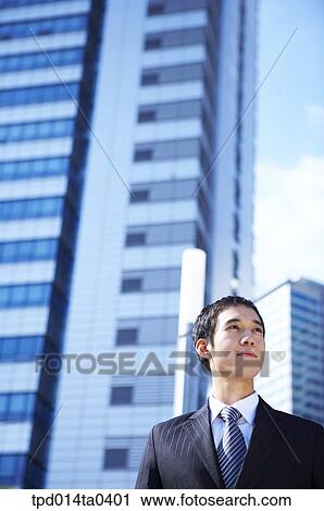 Stock Image - day, daytime, Asian, low angle, person, outside. Fotosearch