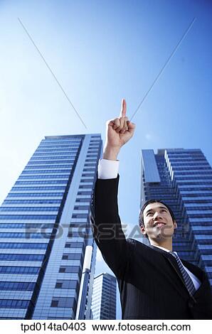 Stock Image - day, daytime, Asian, low angle, person, outside. Fotosearch