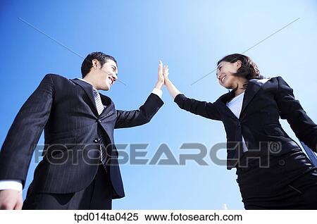 Stock Photography - day, daytime, colleague, Asian, businessman, businesswoman. Fotosearch
