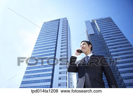 Stock Photo - Korean, Asian, person, business, businessman, outside. Fotosearch