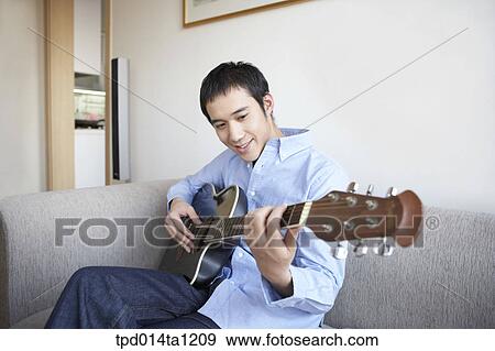 Korean, Asian, person, inside, smile, rest View Large Photo Image Stock Photo - Korean, Asian, person, inside, smile, rest. Fotosearch