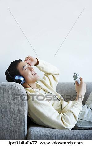 lying, Asian, person, inside, leisure, profile View Large Photo Image Stock Image - lying, Asian, person, inside, leisure, profile. Fotosearch