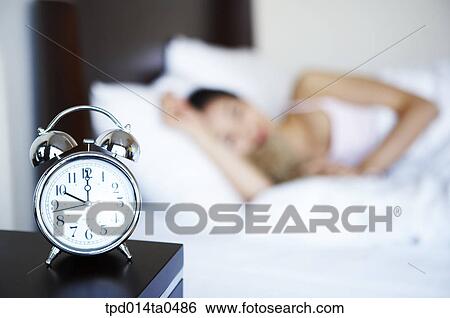 lying, Asian, person, inside, morning, alarm clock, woman View Large Photo Image Stock Photograph - lying, Asian, person, inside, morning, alarm clock, woman. Fotosearch