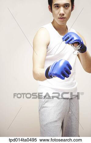 martial arts, boxing gloves, gloves, Asian, action, person, sport View Large Photo Image Stock Photography - martial arts, boxing gloves, gloves, Asian, action, person, sport. Fotosearch