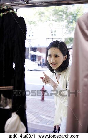 pointing, day, daytime, Asian, person, show window, shopping View Large Photo Image Stock Image - pointing, day, daytime, Asian, person, show window, shopping. Fotosearch