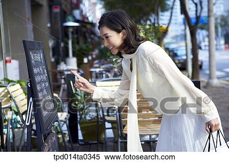 pointing, day, daytime, menu, person, outside, profile View Large Photo Image Stock Photography - pointing, day, daytime, menu, person, outside, profile. Fotosearch
