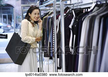 woman, person, inside, shopping bag, shopping, clothes, Asian View Large Photo Image Stock Image - woman, person, inside, shopping bag, shopping, clothes, Asian. Fotosearch