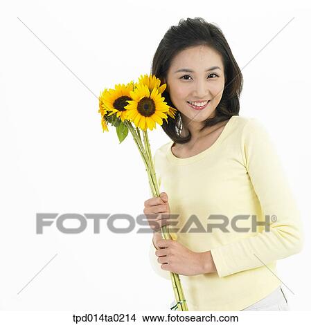 Picture - bouquet, object, Asian, person, smile, young lady, portrait. Fotosearch