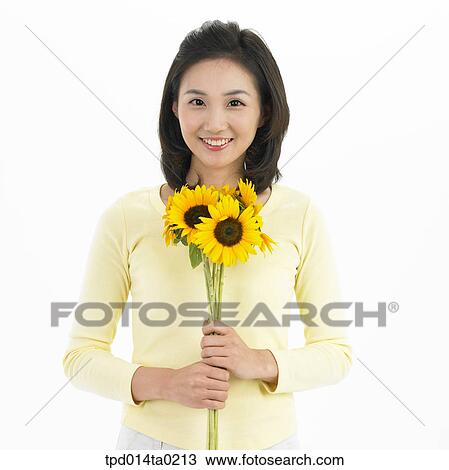 Stock Image - bouquet, object, Asian, person, woman, smile, portrait. Fotosearch