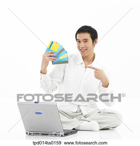 finance, economy, notebook, object, Asian, person View Large Photo Image Stock Photo - finance, economy, notebook, object, Asian, person. Fotosearch