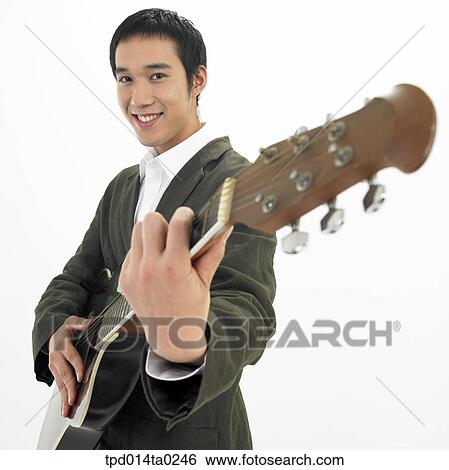 guitarist, object, Asian, person, musical instrument, performance View Large Photo Image Stock Photograph - guitarist, object, Asian, person, musical instrument, performance. Fotosearch