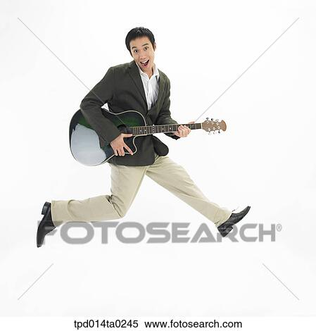guitarist, object, Asian, person, musical instrument, performance View Large Photo Image Stock Photography - guitarist, object, Asian, person, musical instrument, performance. Fotosearch