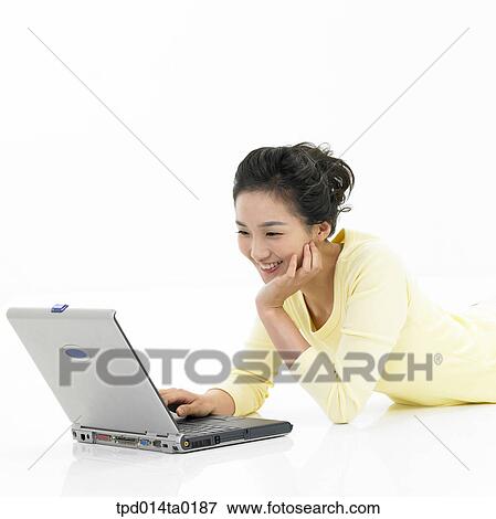 notebook, object, Asian, person, prostrate, woman, jaw View Large Photo Image Stock Photo - notebook, object, Asian, person, prostrate, woman, jaw. Fotosearch