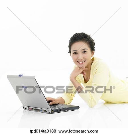 notebook, object, Asian, person, prostrate, woman, smile View Large Photo Image Stock Photo - notebook, object, Asian, person, prostrate, woman, smile. Fotosearch