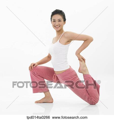 Stock Photograph - object, Asian, action, person, woman, exercise, smile. Fotosearch
