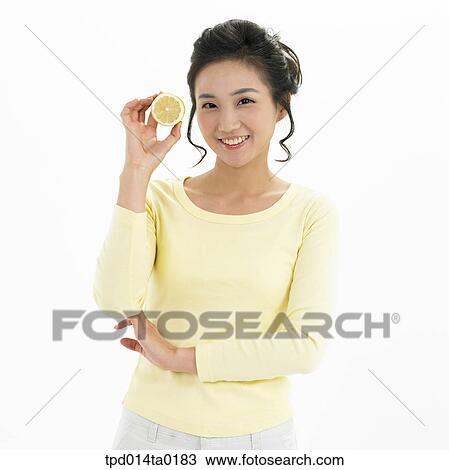 object, Asian, lemon, person, woman, smile, portrait View Large Photo Image Stock Image - object, Asian, lemon, person, woman, smile, portrait. Fotosearch