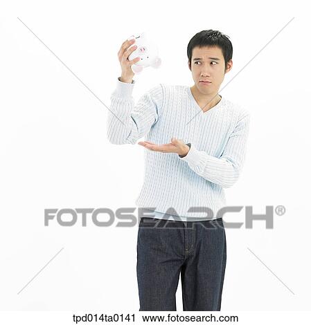 object, Asian, penniless, person, saving, savings box View Large Photo Image Stock Image - object, Asian, penniless, person, saving, savings box. Fotosearch