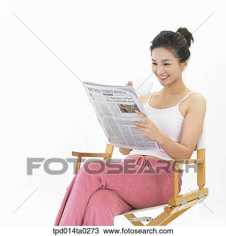 Stock Image - object, Asian, person, newspaper, sitting, woman, smile. Fotosearch