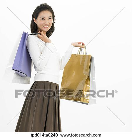 object, Asian, person, shopping, shopping bag, woman, smile View Large Photo Image Stock Image - object, Asian, person, shopping, shopping bag, woman, smile. Fotosearch
