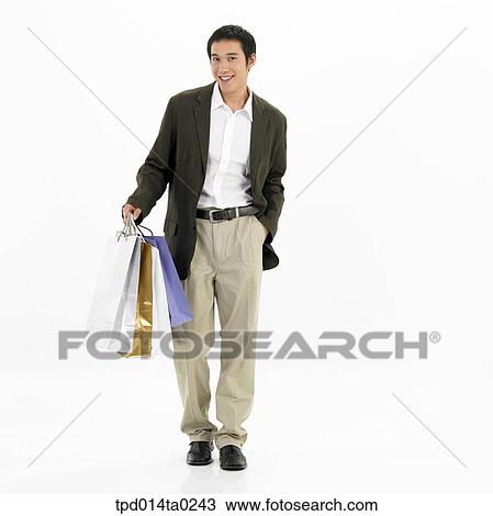 Stock Image - object, Asian, person, shopping, shopping bag, smile. Fotosearch