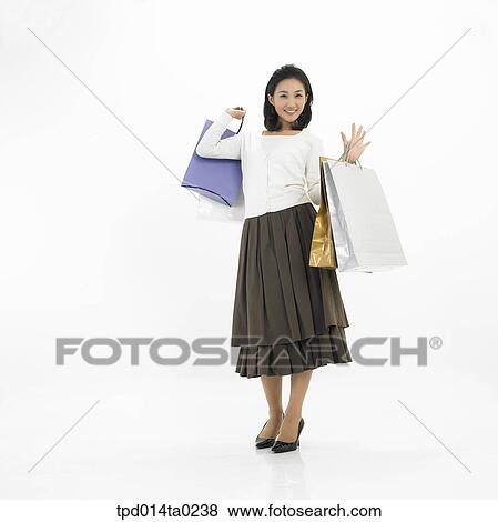 Stock Photo - object, Asian, person, shopping, shopping bag, woman, body. Fotosearch