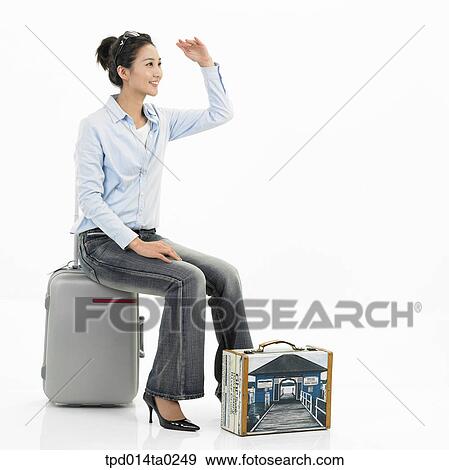 object, Asian, person, sitting, woman, trip, suitcase View Large Photo Image Stock Photo - object, Asian, person, sitting, woman, trip, suitcase. Fotosearch