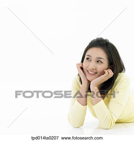 Stock Photo - object, Asian, person, thought, prostrate, woman, jaw. Fotosearch