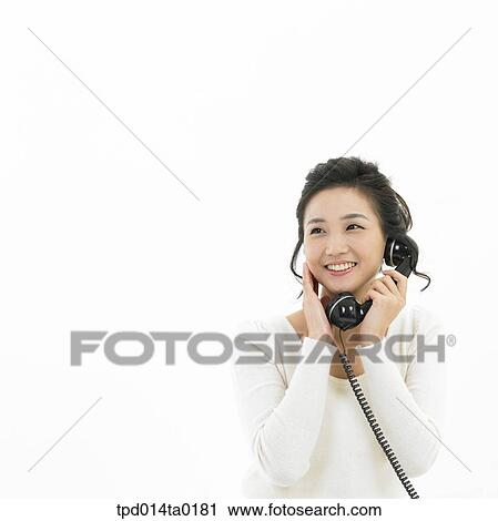 Stock Image - object, Asian, person, woman, smile, telephone, Korean. Fotosearch