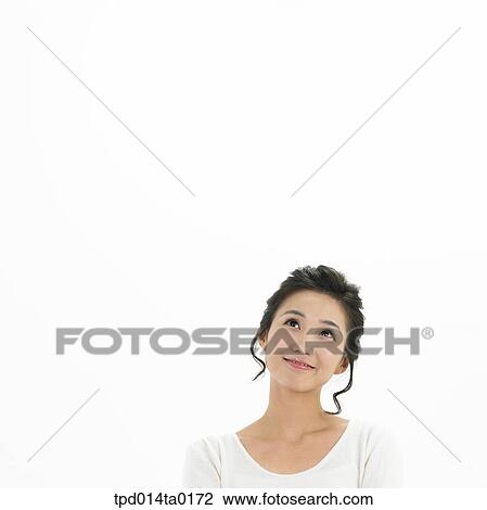 Stock Image - object, Asian, smile, person, bust, thought, woman. Fotosearch