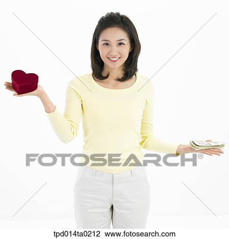 object, money, Asian, person, scale, woman, smile View Large Photo Image Stock Image - object, money, Asian, person, scale, woman, smile. Fotosearch
