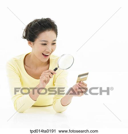 observation, finance, economy, object, magnifier, Asian, person View Large Photo Image Stock Image - observation, finance, economy, object, magnifier, Asian, person. Fotosearch