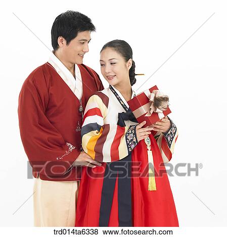 Stock Photo - family, object, friendly, Asian, festival, smile. Fotosearch