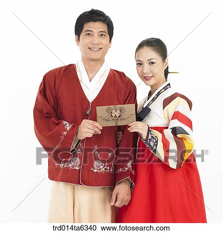 object, Asian, festival, smile, clothes, couple View Large Photo Image Stock Image - object, Asian, festival, smile, clothes, couple. Fotosearch