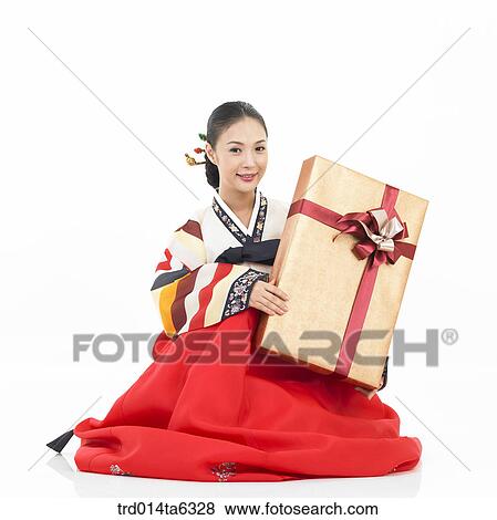 Stock Photo - object, Asian, festival, smile, clothes, person, gift. Fotosearch