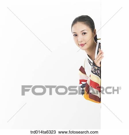 Stock Image - object, Asian, festival, smile, wall, clothes, person. Fotosearch