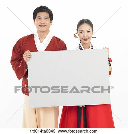 Stock Image - object, Asian, message, smile, clothes, couple. Fotosearch