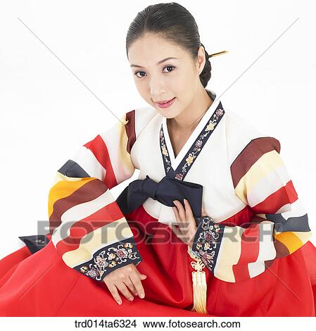 object, Asian, smile, clothes, person, new year, sitting View Large Photo Image Picture - object, Asian, smile, clothes, person, new year, sitting. Fotosearch