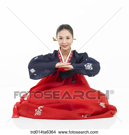 Picture - object, Asian, smile, clothes, person, New Year's Day, New Year´s greetings. Fotosearch
