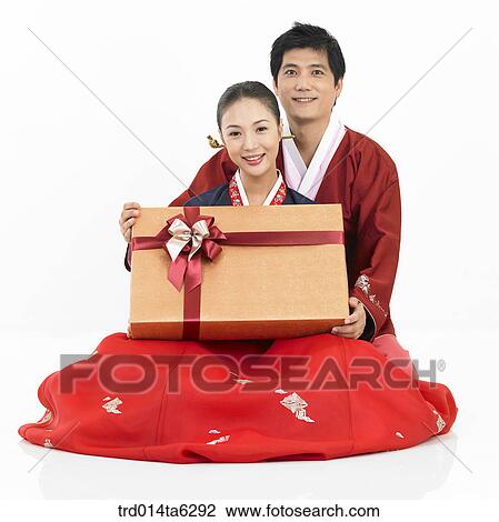 object, friendly, Asian, smile, clothes, couple View Large Photo Image Stock Image - object, friendly, Asian, smile, clothes, couple. Fotosearch