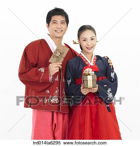 Stock Photography - object, friendly, Asian, smile, clothes, couple. Fotosearch