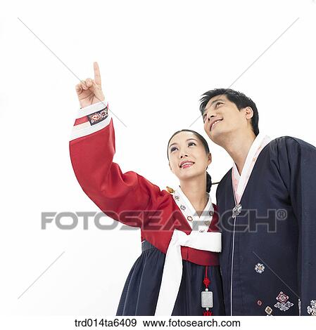Stock Photo - pointing, family, object, Asian, low angle, festival. Fotosearch