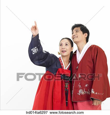pointing, family, object, Asian, smile, clothes View Large Photo Image Stock Photo - pointing, family, object, Asian, smile, clothes. Fotosearch